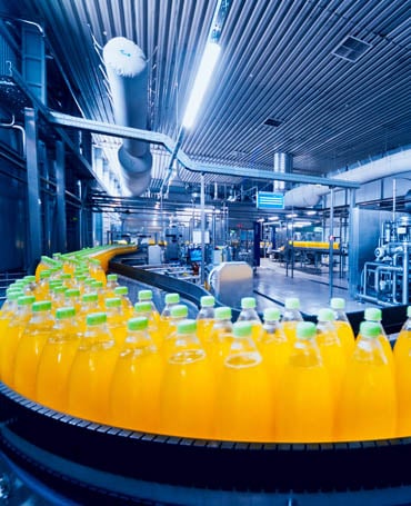 Orange soda on a conveyer line